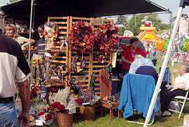 Large arts and crafts displays, great food concessions, and tons of fun at the Apple Butter Fall Harvest Festival at MacQueen Apple Orchard, Cider Mill, Farm Market, and Pick Your Own Apples, Holland, Ohio, west of Toledo